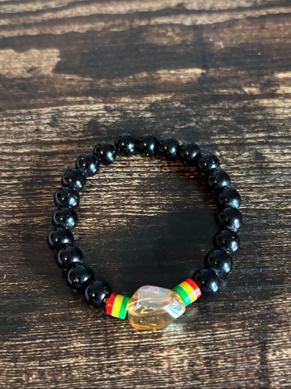 Black Beaded Stretch Bracelet‎ with Rasta Accent